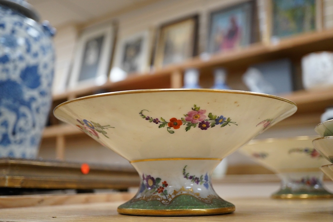 A 19th century French Paris porcelain part dessert service with green scale borders by Nast Paris, largest 26cm wide